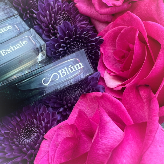 Close-up of the Blüm 10ml roller bottle, featuring a light and airy essential oil blend designed for expansion and growth.