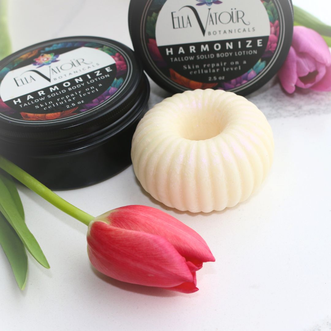 A minimalist ancestral skincare set including handcrafted grass-fed tallow balm and solid lotion for deep hydration and soft skin.