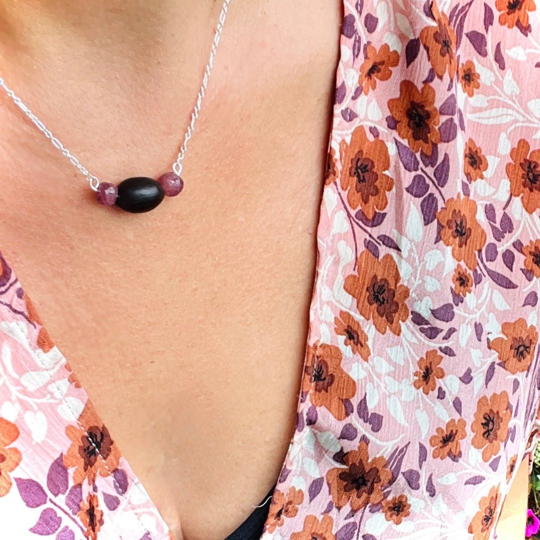 Ella Vatoür Blüm Ruby Talisman — handmade lotus seed and ruby necklace on sterling silver chain