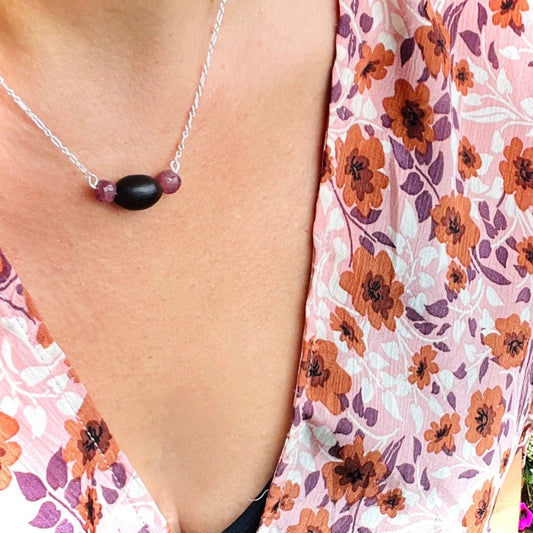 Ella Vatoür Blüm Ruby Talisman — handmade lotus seed and ruby necklace on sterling silver chain