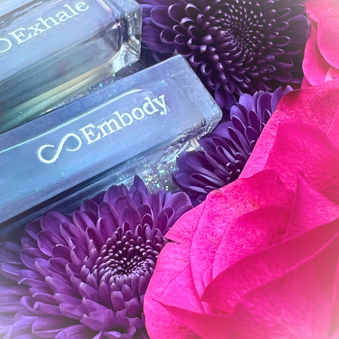 Close-up of the EMBODY 10ml glass roller bottle, featuring handcrafted botanical oils designed for intentional daily wear.