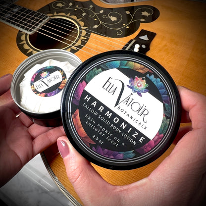 A portable, mess-free solid tallow lotion bar perfect for travel and targeted hydration on dry elbows and knees by Ella Vatour.